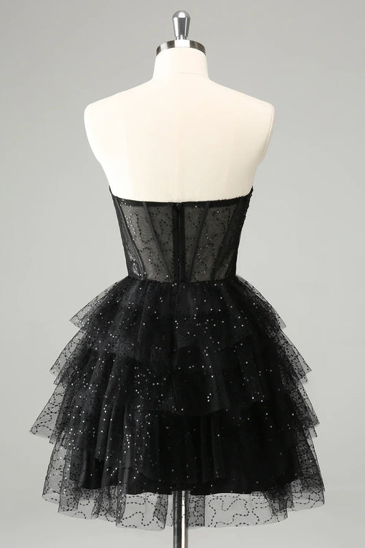 omberprom Cute A Line Strapless Homecoming Dress Sparkly Black Sweetheart Pleated Corset with Sequins