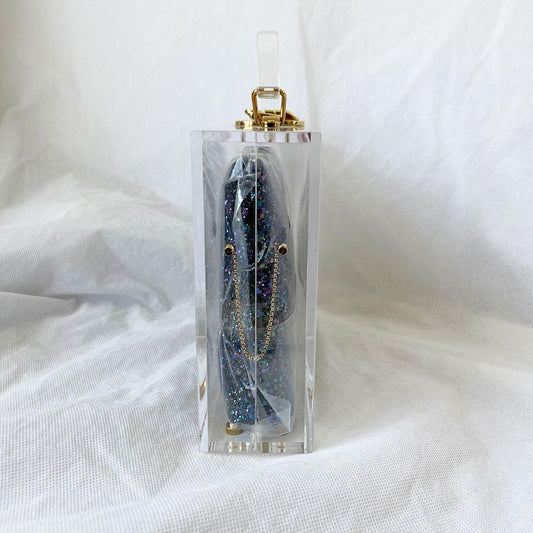 Charlotte Olympia clear acrylic box clutch with blue glittery zip pouch