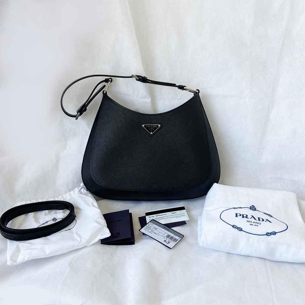 Prada triangle logo cleo bag in saffiano black leather