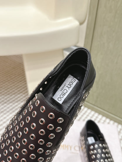 Jimmy Choo Eliot flat Slippers Metallic Eyelets Black Calfskin 568492