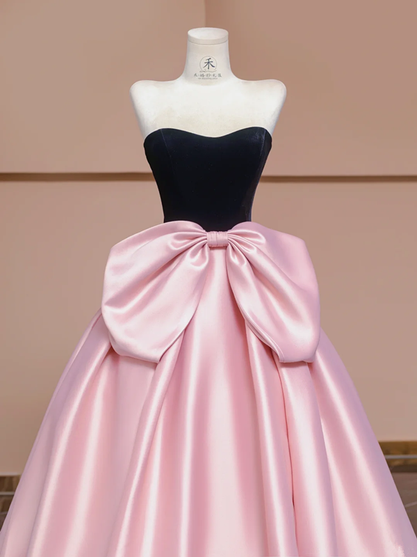 Black strapless bodice with a fitted waist and pink tulle skirt, a ball gown/bridal dress R8359