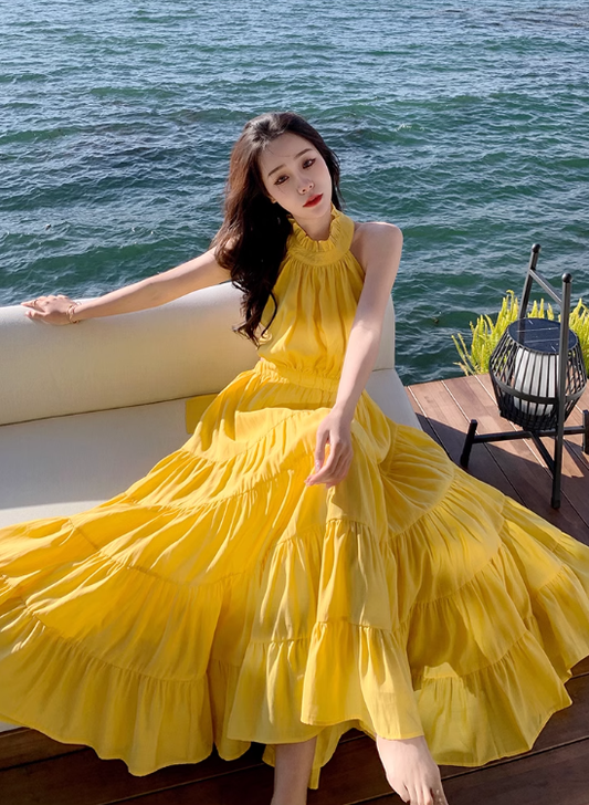 Beach holiday dress hides flesh and makes you look thin. Yellow backless French long skirt R0181