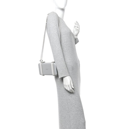 X RIMOWA Aluminum Personal Clutch On Strap Silver