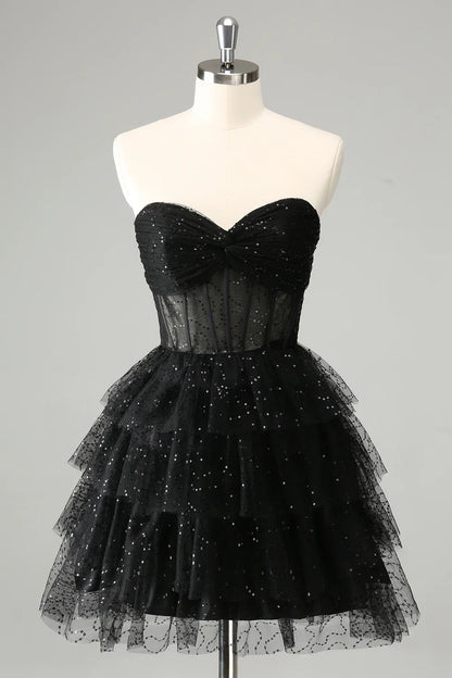 omberprom Cute A Line Strapless Homecoming Dress Sparkly Black Sweetheart Pleated Corset with Sequins