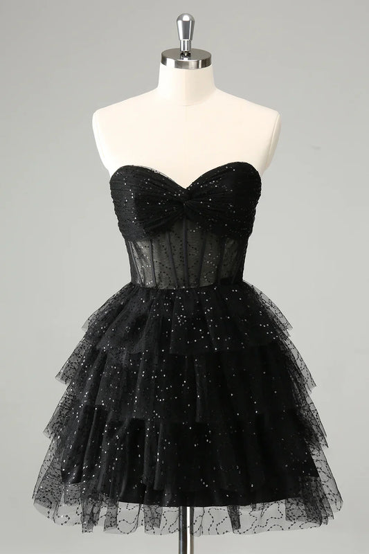 omberprom Cute A Line Strapless Homecoming Dress Sparkly Black Sweetheart Pleated Corset with Sequins