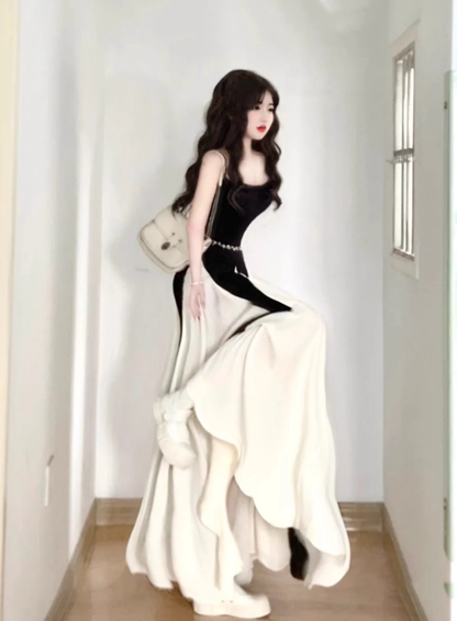 2025 new French black and white contrast suspender dress seaside holiday temperament waist A-line long skirt R0423