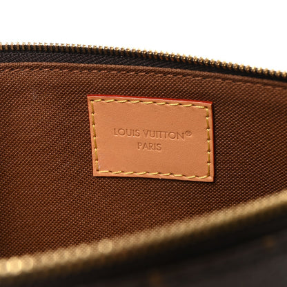 Monogram Eva Clutch NM