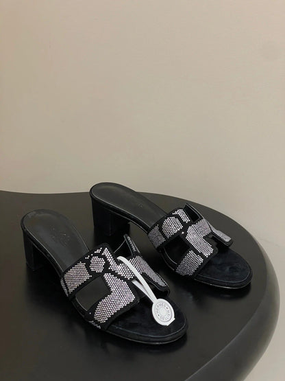 HM 25S ORAN HIGH‐HEEL SANDAL 50 MM IN BLACK LAMBSKIN WITH WHITE STONE DETAILS
