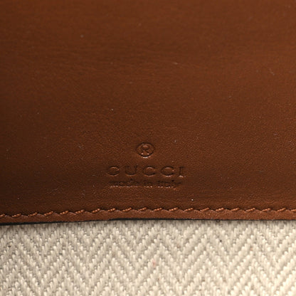 GG Supreme Monogram Textured Calfskin Emblem Mini Crossbody Beige Dark Brown