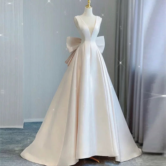 Chic Ball Gown V neckline Sleeveless Ivory Satin Long Wedding Dresses With Bow C3600
