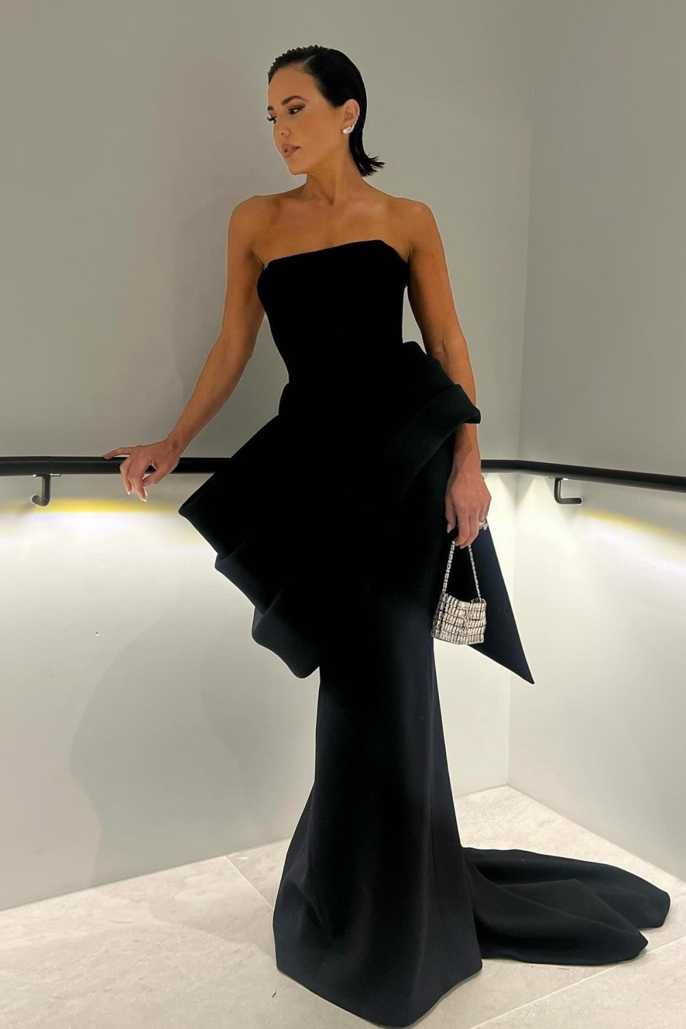 Elegant Strapless Black Mermaid Gown with Statement Draping