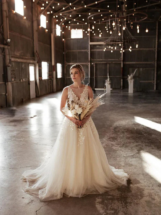 Enchanting Applique Tulle A-line Wedding Dresses Sleeveless Floor Length Bridal Gown