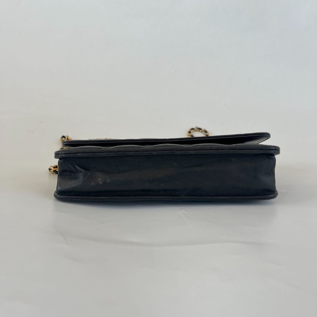 Chanel black quilted lambskin wallet on chain crossbody bag