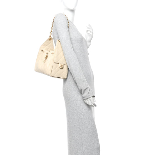 Caviar Quilted Small Chanel 25 Handbag Beige