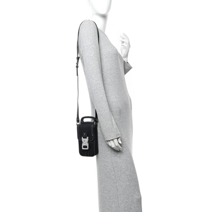 Grained Calfskin Vertical Saddle Pouch With Strap Black