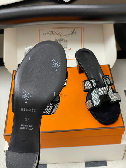 HM 25S ORAN HIGH‐HEEL SANDAL 50 MM IN BLACK LAMBSKIN WITH WHITE STONE DETAILS