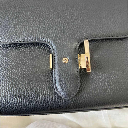 Gucci interlocking G black leather flap bag with goldtone hardware